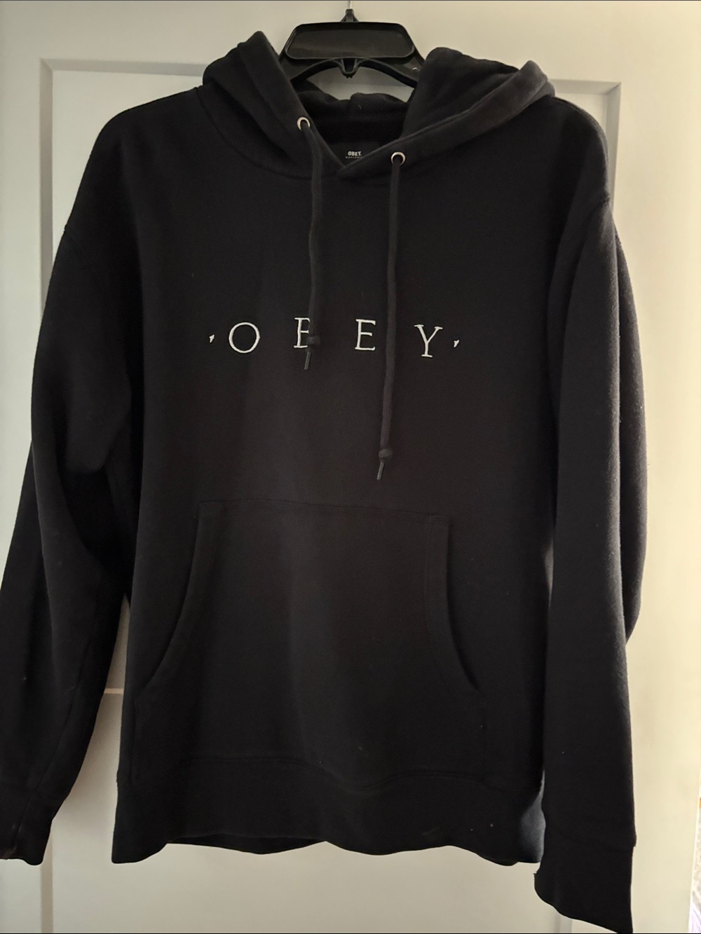 Vintage Obey long sleeve hooded sweatshirt in black. Small
